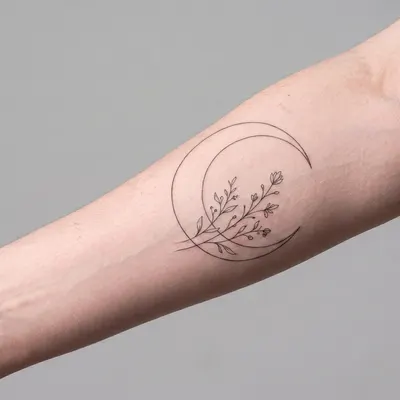 fine line tattoo on a light-skinned arm